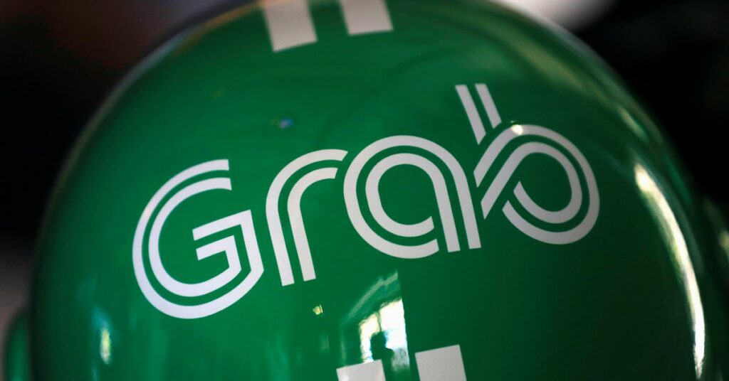 A Grab logo is pictured at the Money 20/20 Asia Fintech Trade Show in Singapore March 21, 2019. REUTERS/Anshuman Daga/File Photo/File Photo
