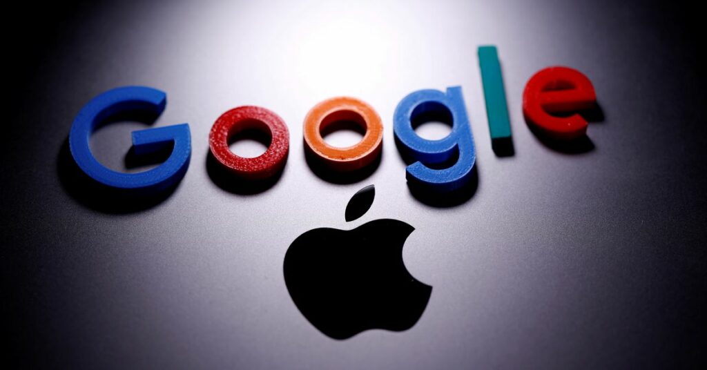 A 3D printed Google logo is placed on the Apple Macbook in this illustration taken April 12, 2020. REUTERS/Dado Ruvic/Illustration/