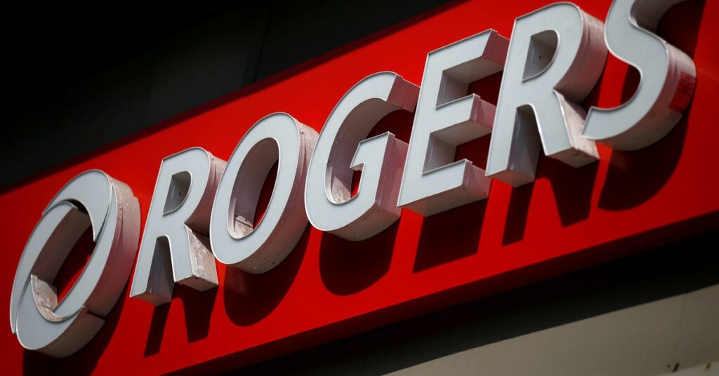 A sign is pictured outside a Rogers Communications retail store in Ottawa, Ontario, Canada July 20, 2017. REUTERS/Chris Wattie