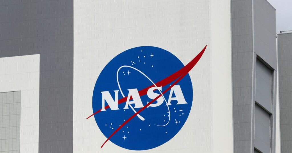 The NASA logo is seen at Kennedy Space Center ahead of the NASA/SpaceX launch of a commercial crew mission to the International Space Station in Cape Canaveral, Florida, U.S., April 16, 2021. REUTERS/Joe Skipper