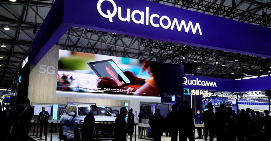 People visit a Qualcomm booth at the Mobile World Congress (MWC) in Shanghai, China February 23, 2021.   REUTERS/Aly Song