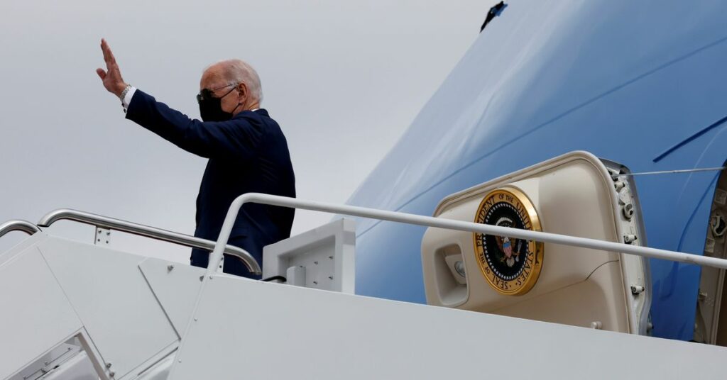 U.S. President Joe Biden waves as he boards Air Force One for travel to Michigan from Joint Base Andrews, Maryland, U.S. October 5, 2021. REUTERS/Jonathan Ernst