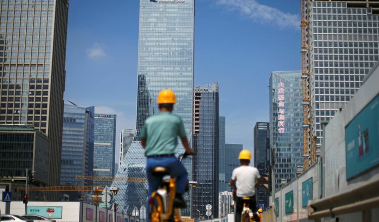 The China Evergrande Centre building sign is seen in Hong Kong, China September 23, 2021. REUTERS/Tyrone Siu