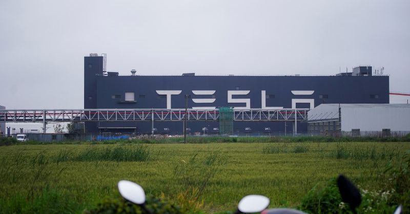 A Tesla sign is seen at its factory in Shanghai, China, May 13, 2021. REUTERS/Aly Song/Files