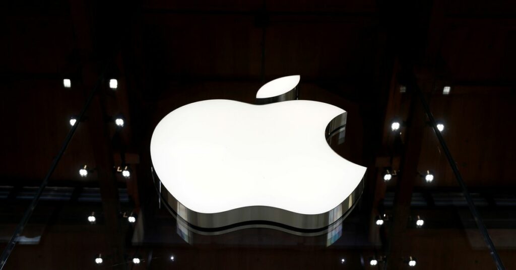 An Apple logo is pictured in an Apple store in Paris, France September 17, 2021. REUTERS/Gonzalo Fuentes/File Photo