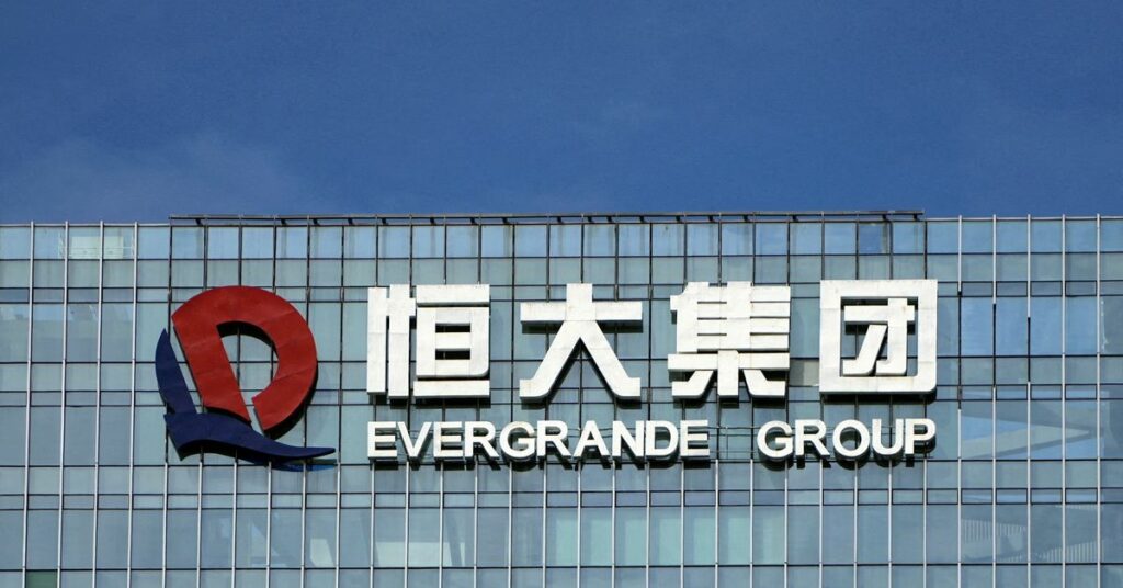 The company logo is seen on the headquarters of China Evergrande Group in Shenzhen, Guangdong province, China September 26, 2021. REUTERS/Aly Song