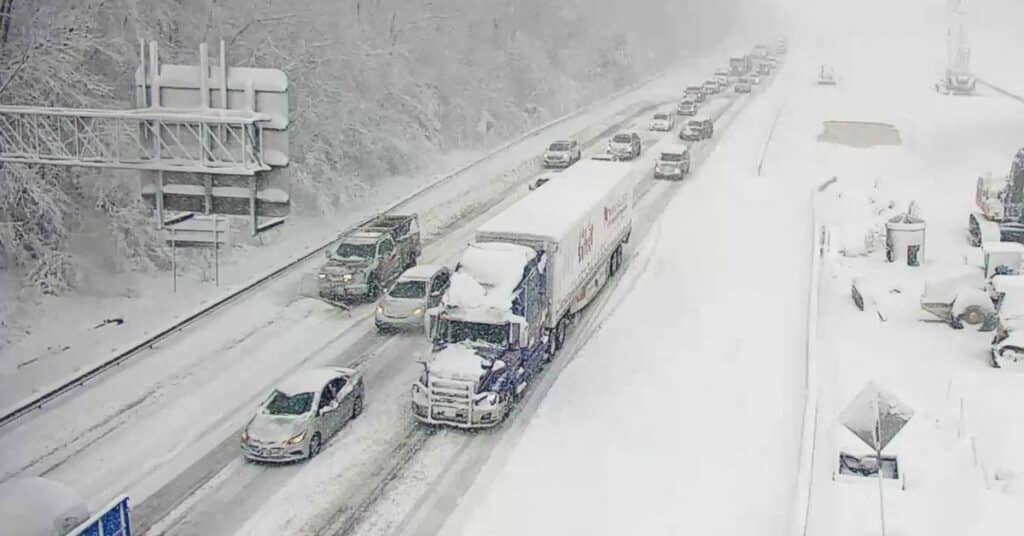Vehicles are seen in a still image from video as authorities worked to reopen an icy stretch of Interstate 95 closed after a storm blanketed the U.S. region in snow a day earlier, near Garrisonville, Virginia, U.S. January 4, 2022.  ABC/WJLA via REUTERS