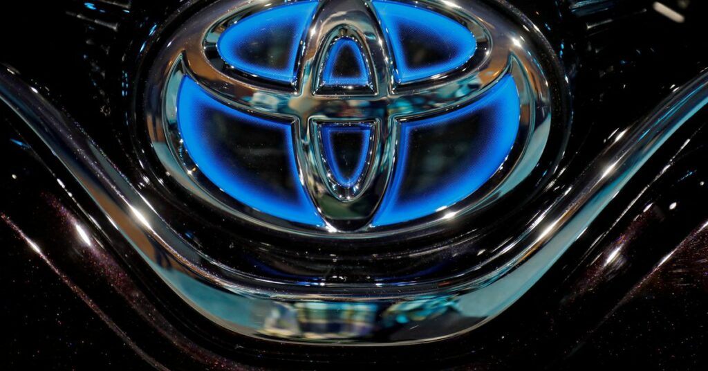 The Toyota logo is seen on the hood of a newly launched Camry Hybrid electric vehicle in New Delhi, India, January 18, 2019. REUTERS/Anushree Fadnavis