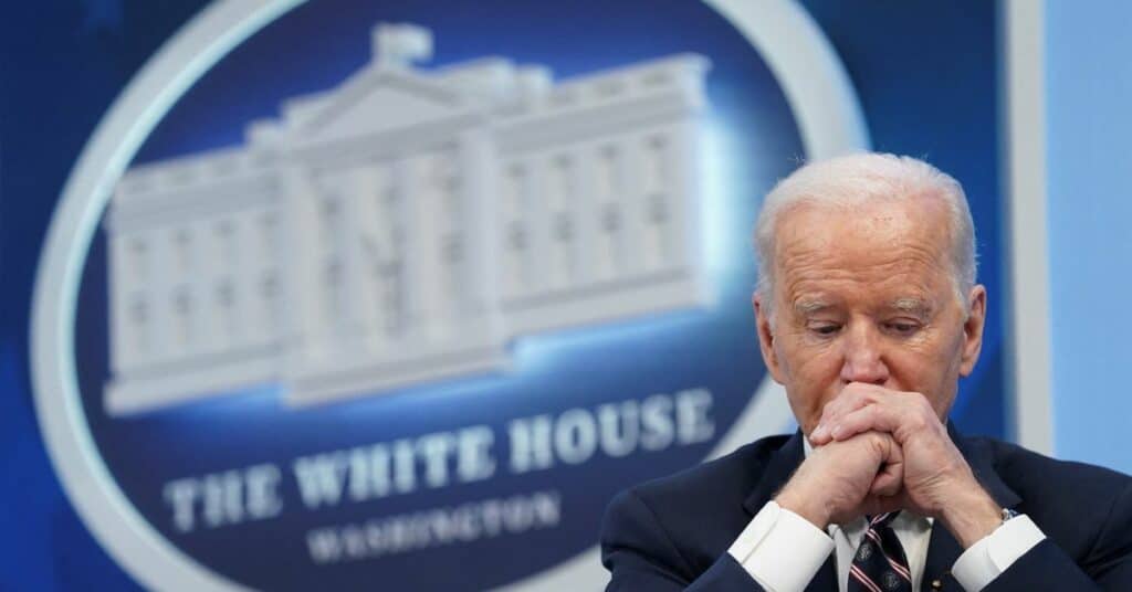 U.S. President Joe Biden looks down while hosting a virtual roundtable on securing critical minerals at the White House in Washington, U.S., February 22, 2022. REUTERS/Kevin Lamarque 