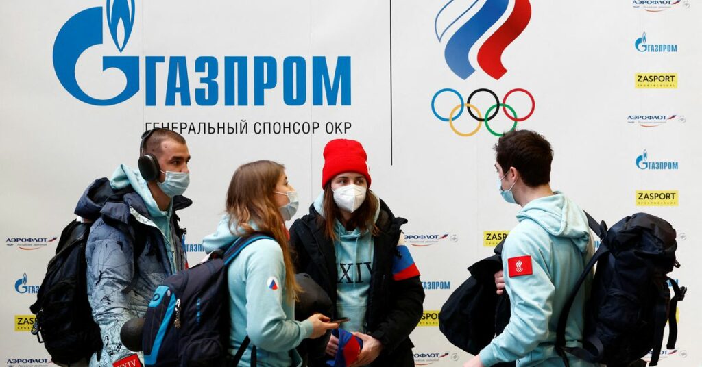 Russian athletes are seen before their departure for the Beijing 2022 Winter Olympics at Sheremetyevo airport in Moscow, Russia January 26, 2022. REUTERS/Maxim Shemetov