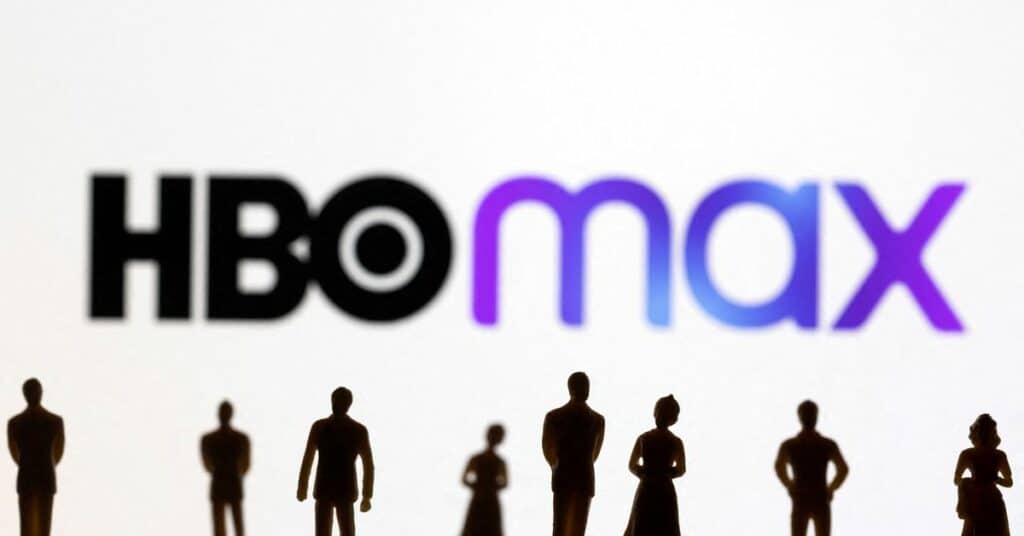 Toy figures of people are seen in front of the displayed HBO Max logo, in this illustration taken January 20, 2022. REUTERS/Dado Ruvic/Illustration