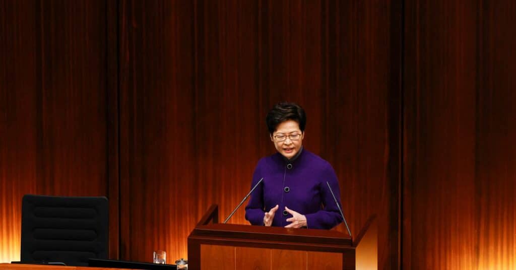 Chief Executive Carrie Lam takes questions from lawmakers during the first regular meeting of the legislature at the Legislative Council in Hong Kong, China, January 12, 2022. REUTERS/Tyrone Siu