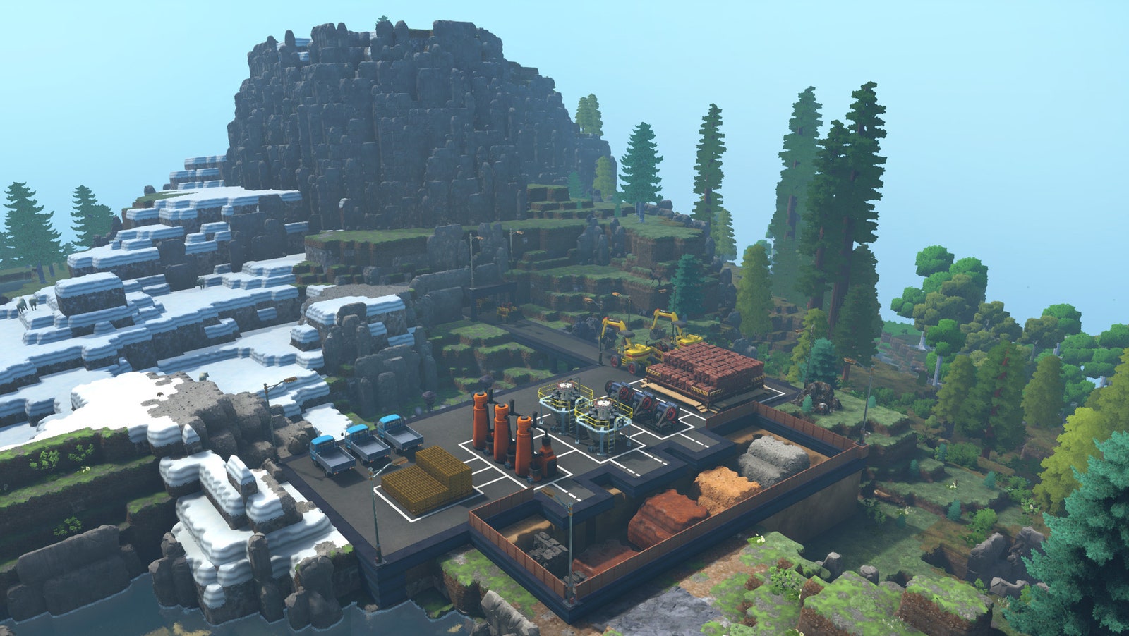 Captura de pantalla del juego ecológico con una gran fábrica en un entorno montañoso