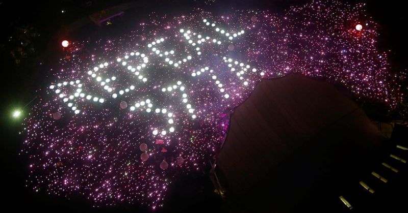 Participants of Pink Dot, an annual event organised in support of the LGBT community, gather in a formation protesting the repeal of Section 377A of Singapore