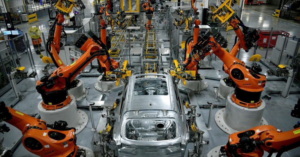 Autonomous robots assemble an X model SUV at the BMW manufacturing facility in Greer