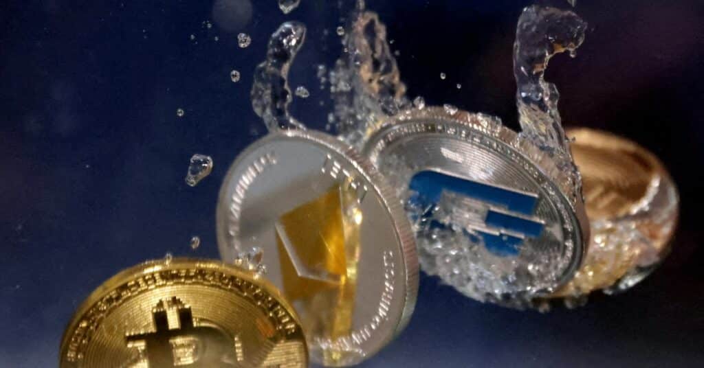 Illustration shows representation of cryptocurrency Bitcoin, Ethereum and Dash plunging into water