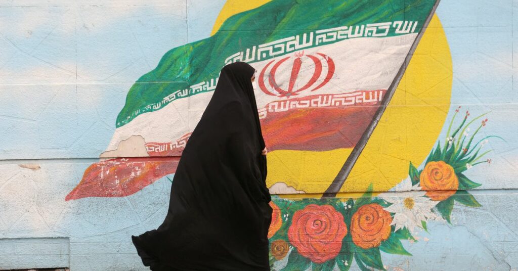 Women walk after morality police shut down in Tehran