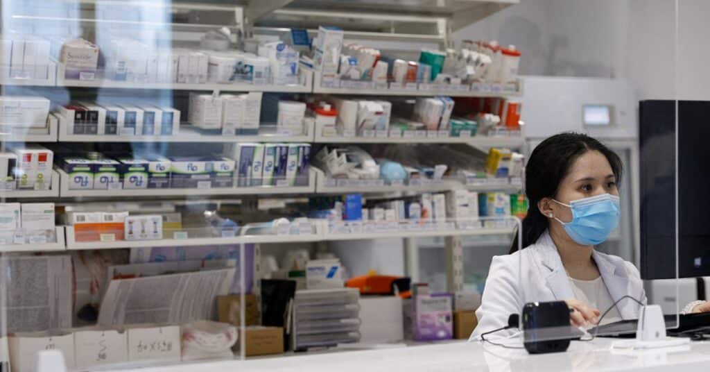 A pharmacist works at a private clinic in Hong Kong